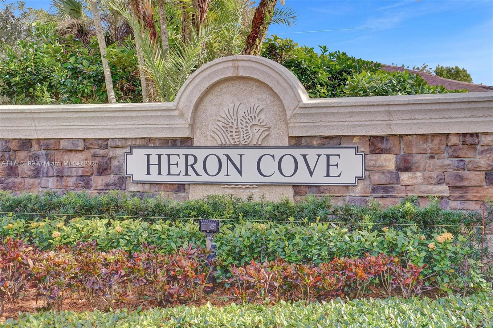 Renovated 3-bedroom 2-bathroom house in guard-gated Heron Cove, Parkland. The home with volume ceilings shows expansive remodeling such as high-end laminates in the living and dining area; a gorgeous gourmet open kitchen with a cooking island, quartz counter tops, stainless steel appliances, and elegant lighting; wood floors in 2 bedrooms; guest bathroom. Plantation shutters; accordion shutters for storm protection; a screened patio overlooking a spacious backyard with room for a pool; laundry room; 2-car garage. Heron Bay is a pet-friendly community offering amazing amenities, including 2 clubhouses, heated pool, tennis, pickleball, volleyball, basketball, gym, playground, picnic area, walking trails. Close to malls, restaurants, medical care, Sawgrass expressway and more.No HOA approval.