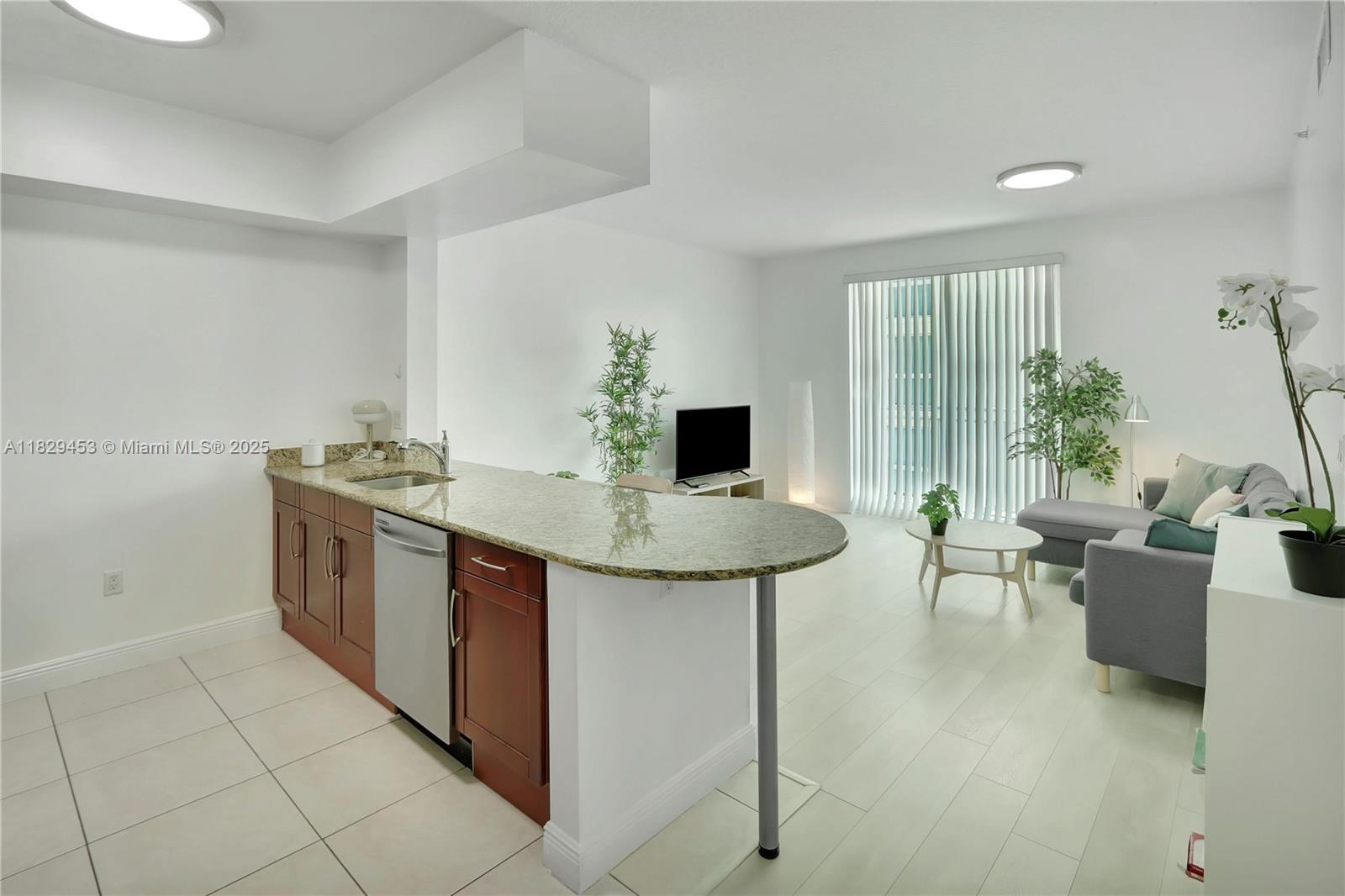 CORNER 2 BEDROOM, 2 BATHROOM CONDO with HIGH CEILINGS, OPEN BALCONY, IMPACT GLASS, WASHER AND DRYER INSIDE UNIT. It comes FURNISHED or UNFURNISHED if needed. ONE SMALL DOG ALLOWED UNDER 20 LBS. with REFUNDABLE DEPOSIT. COME SEE WHY SO MANY LOVE DOWNTOWN DADELAND's WALKABLE FRIENDLY NEIGHBORHOOD with trendy restaurants, shopping, the Metro Rail, expressways and main highways all within minutes. A LIGHT-FILLED HOME WAITING FOR YOU.