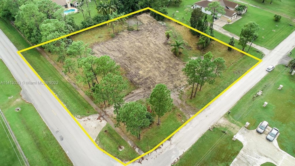 Photo of 7355 Mandarin Blvd, Loxahatchee, FL 33470 (MLS # A11413033)