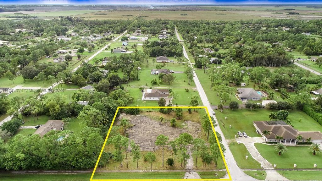 Photo of 7355 Mandarin Blvd, Loxahatchee, FL 33470 (MLS # A11413033)