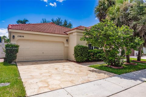 Photo of 15850 NW 11th St, Pembroke Pines, FL 33028 (MLS # A11874858)