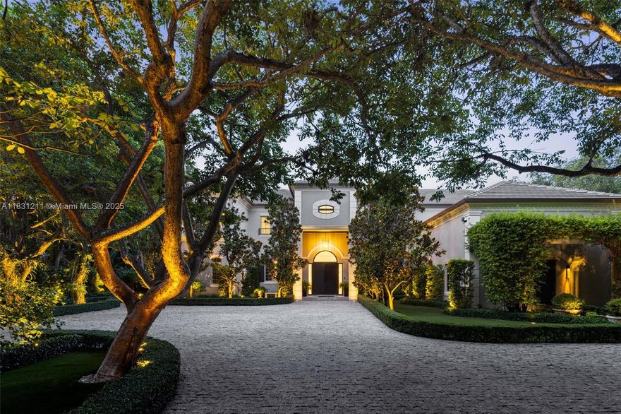 Located behind private gates in highly desirable Ponce-Davis, this exceptional estate sits on nearly 42,000 SF of lush grounds. With over 10,000 SF of elegant living space, the home features grand formal areas, a gourmet chef’s kitchen, media room, and multiple living spaces designed for entertaining. The primary suite offers a private retreat with spa-like bath and sitting area. Outdoors, enjoy a resort-style pool, summer kitchen, and impeccably manicured gardens with multiple covered terraces and pergolas. A rare offering in one of Miami’s most prestigious neighborhoods.