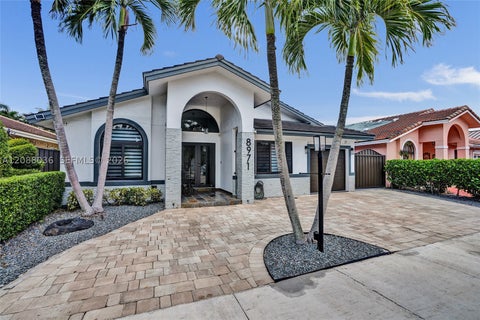 Photo of 8971 NW 150th Ter, Miami Lakes, FL 33018 (MLS # A12088036)