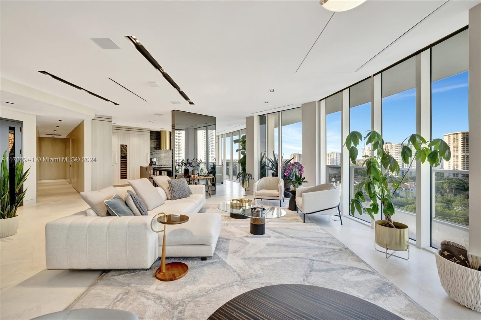 PRIVATE ELEVATOR OPENS DIRECTLY TO THIS IMPECCABLE DESIGNER DECORATED AND RENOVATED NE FACING 3 BED 3.5 BATH MASTERPIECE…. ONE OF A KIND!! BELLINI IS WILLIAMS ISLAND'S NEWEST BUILDING W/ ONLY 68 RESIDENCES. 10 FT FLOOR TO CEILING HURRICANE IMPACT WINDOWS AND PANORAMIC VIEWS FROM THE EXTENSIVE BALCONY. MARBLE AND WOOD FLOORING, OPEN CONCEPT ITALIAN KITCHEN, FLOATING WALLS, SEAMLESS DOORS, DESIGNER FINISHES, DECOR AND LIGHTING ADORN THIS NEWLY RENOVATED HOME. CRESTRON SMART HOME. LIVE THE WILLIAMS ISLAND COUNTRY CLUB LIFESTYLE: 27,000 SQ FT GYM & FULL-SERVICE SPA W/ INDOOR POOL, 15 TENNIS COURTS, 4 PICKLEBALL COURTS, DOG PARK, CHILDREN'S PLAYGROUND, 3 RESTAURANTS, DEEP WATER MARINA. **** UNIT HAS BOTH SELF PARKING AND COMPLIMENTARY VALET. BELLINI ALLOWS 2 DOGS W/ NO WEIGHT LIMIT ****