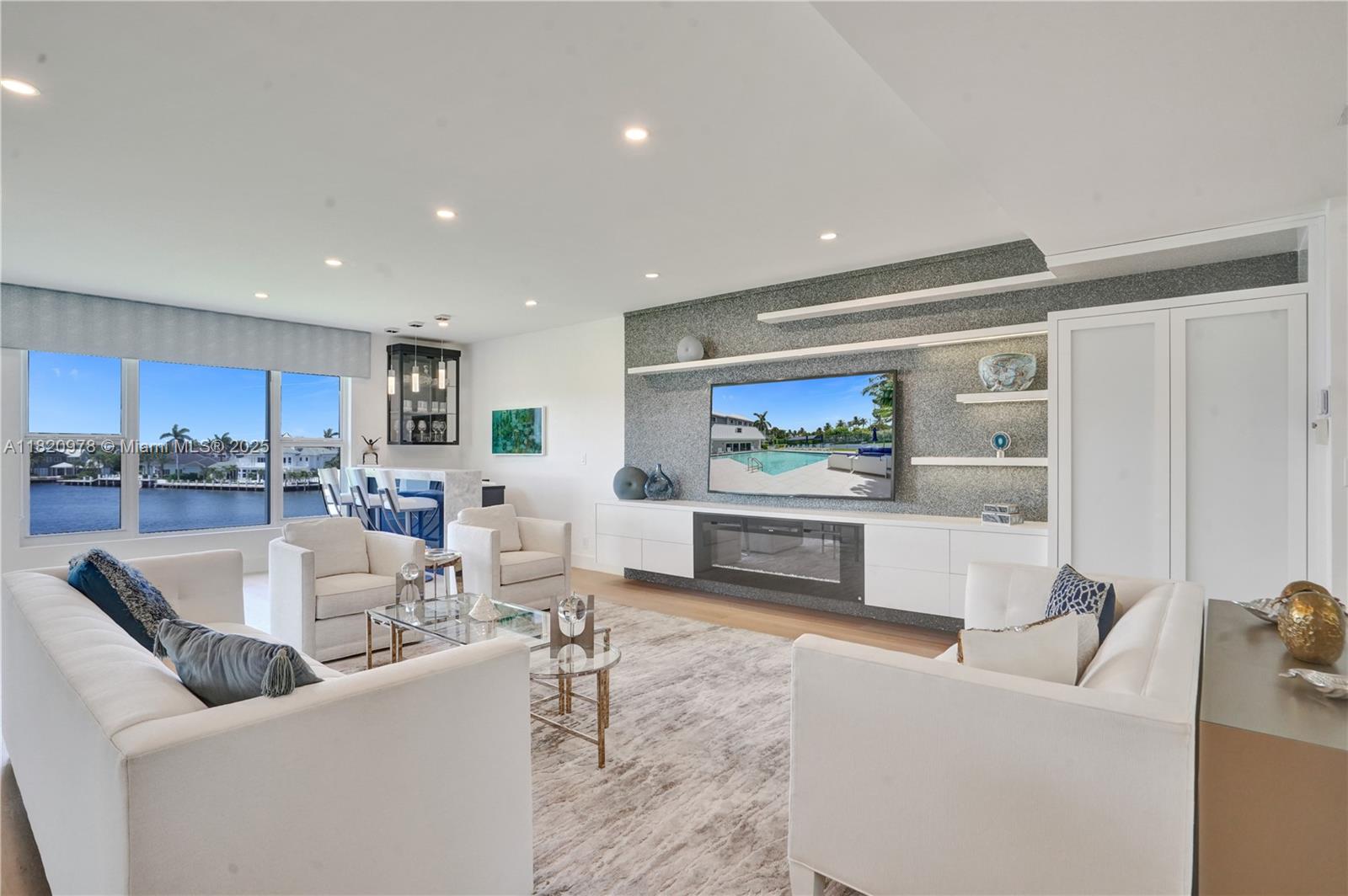 Premier residence in exclusive waterfront community in Delray Beach on the Intracoastal, steps from a private beach club with full kitchen, party room and 2 guest suites. Residence offers casual elegance and sophisticated coastal living. Stunning sunsets with direct Intracoastal views. Two-bedroom plus den/3rd bedroom, 4 full baths, customized walk-in closet, formal dining room, spacious living room with built-in bar, eat-in kitchen with stainless appliances, enclosed balcony with retractable high-impact sliding door, laundry room, large storage room, & a 2-car garage. Resort-style pool, tennis & pickle-ball courts, beautifully landscaped 5-acre grounds. Pet-friendly, professionally managed, located near vibrant Atlantic Avenue, Palm Beach & Fort Lauderdale airports. Furniture negotiable.