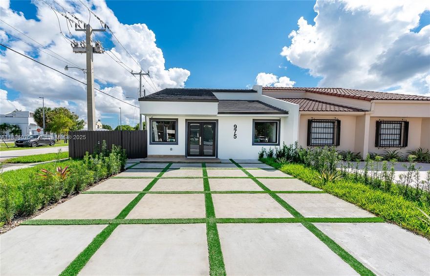 Experience modern living in this beautifully renovated 1,300 Sq.Ft. 3-bedroom, 3-bath twin home perfectly situated on a corner lot in the heart of Miami. Thoughtfully designed, the property offers a flexible layout with the potential for a private 1-bedroom, 1-bath in-law suite at the rear—ideal for guests, extended family, or rental income. Every detail has been updated, including new plumbing, electrical, roof, impact windows, flooring, kitchen, and bathrooms. The home also features a brand-new driveway, fencing, and full home security system with cameras for peace of mind. Each room is pre-wired and TV-ready for seamless entertainment. Move right in and enjoy a like-new home that combines comfort, versatility, and security—all in one of Miami’s most central and convenient locations.