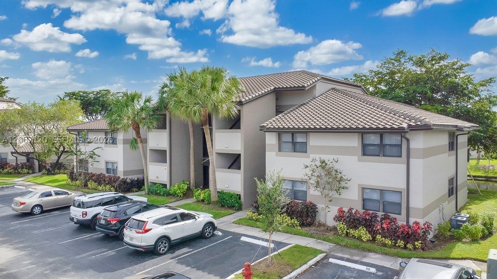 Photo of 9894 Nob Hill Ln #9894, Sunrise, FL 33351 (MLS # A12087120)