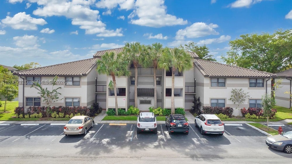 Photo of 9894 Nob Hill Ln #9894, Sunrise, FL 33351 (MLS # A12087120)