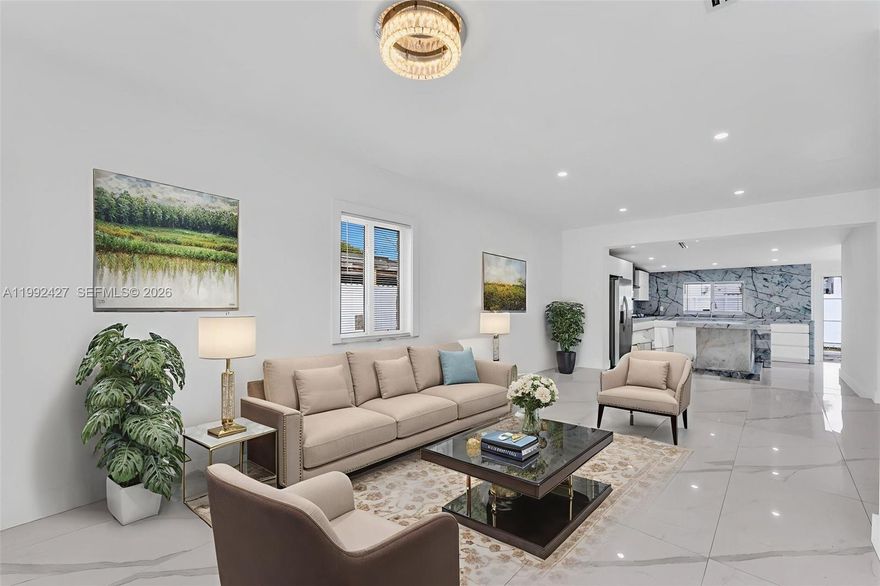 This stunning, move-in ready home has been completely upgraded with modern finishes and high-quality craftsmanship throughout. Featuring 4 spacious bedrooms and 3 fully renovated bathrooms, this property is perfect for families or investors seeking comfort and style.

The brand-new marble kitchen is a true highlight, designed with elegant countertops, custom cabinetry, and modern lighting. Enjoy peace of mind with a new roof, impact windows, and fully updated plumbing system. All renovations have been completed with permits.

The home offers a generous layout with plenty of natural light and space for entertaining. The property is fully fenced for privacy and includes rear access—ideal for additional parking, boat or RV, or even future income potential.

Located in a highly desirable area of Hialeah, close to major highways, shopping centers, schools, and dining options.