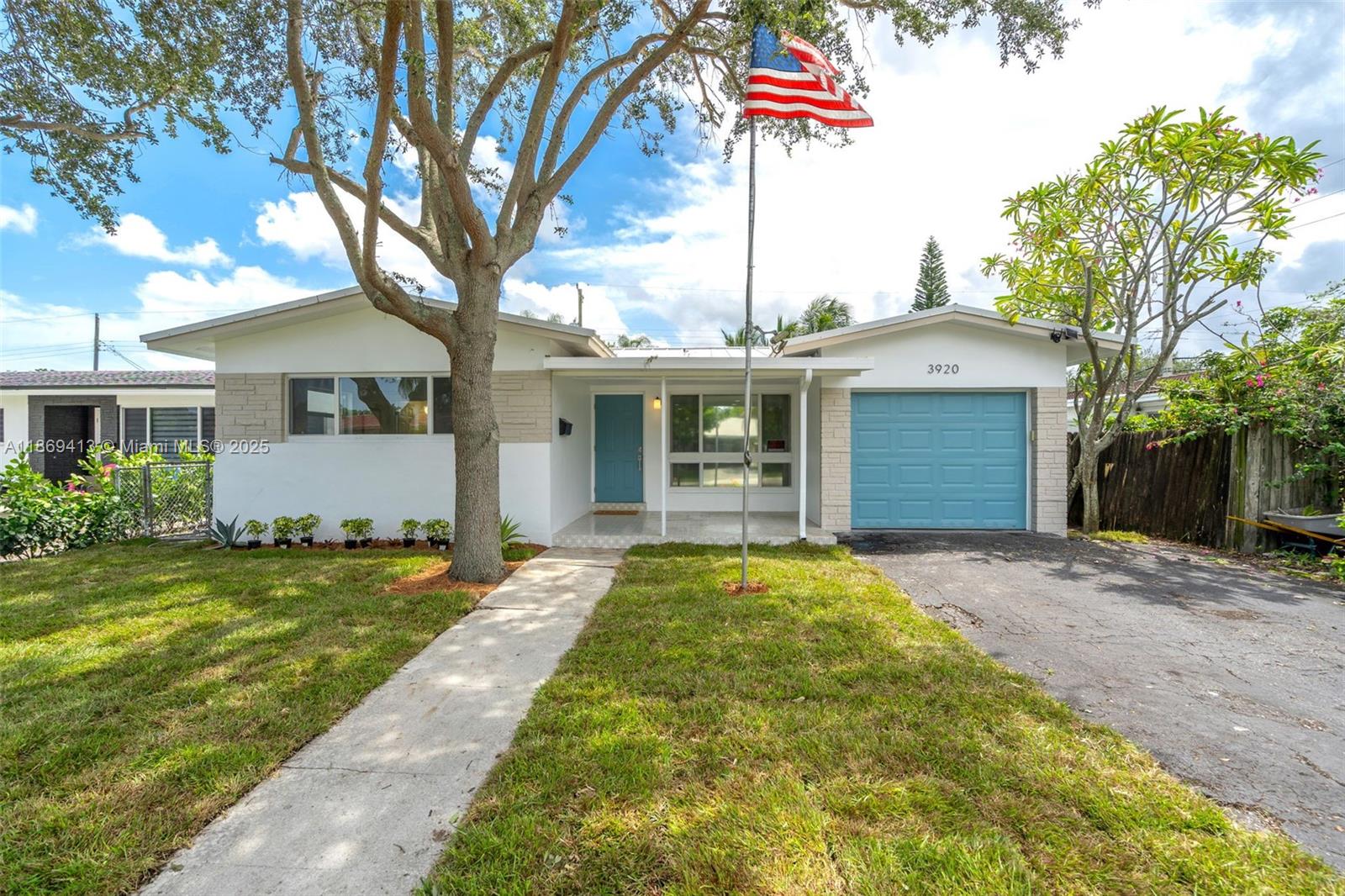 Beautifully 3BD/2BA home in sought-after Hollywood Hills with 1,558 sq ft of stylish living on a 6,251 sq ft lot. This one-story residence offers an open layout with impact windows/doors, metal roof, and wide-plank flooring. The modern kitchen features quartz countertops, waterfall island, custom cabinetry, and new stainless steel appliances. Bathrooms boast designer finishes and contemporary fixtures. The primary suite includes a walk-in closet and private bath with dual vanities and glass shower. Enjoy a 1-car garage with laundry, plus a backyard oasis with covered patio, new tile flooring, ceiling fans, and sparkling pool. New fence awaiting city approval. Conveniently near schools, shopping, dining, highways, and minutes from beaches. No HOA.
