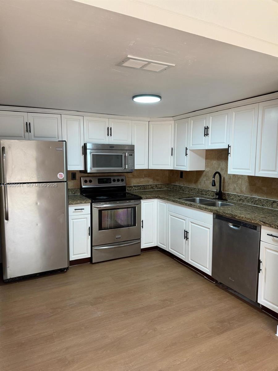 BRENTWOOD WEST TOWNHOUSES - Residential Lease