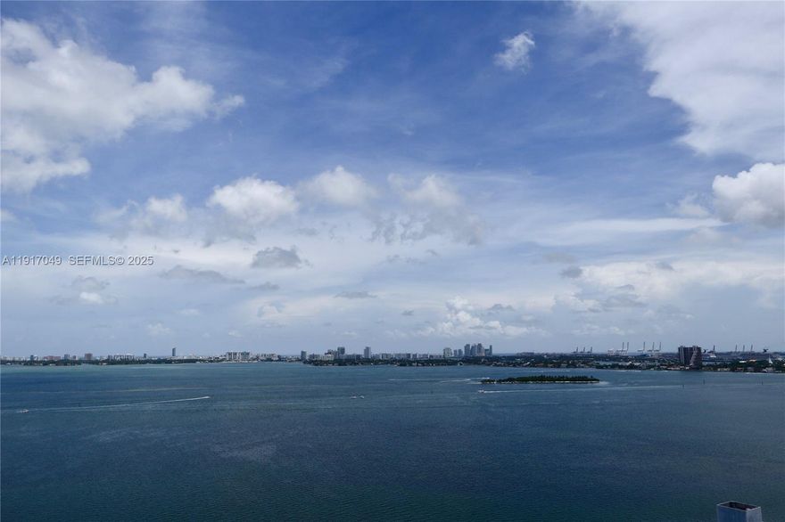 MESMERIZING BAY VIEWS FROM THIS BEAUTIFUL AND SPACIOUS 1/2 UNIT, PLUS DEN.  PORCELAIN FLOORS THROUGHOUT, EUROPEAN KITCHEN WITH QUARTZ COUNTERTOP AND TOP OF THE LINE APPLIANCES.  EXCELLENT LOCATION IN EDGEWATER, STATE OF THE ART GYM, SPA, CIGAR LOUNGE, WINE ROOM, MOVIE THEATER, AND MUCH MORE. MINUTES FROM DOWNTOWN MIAMI.