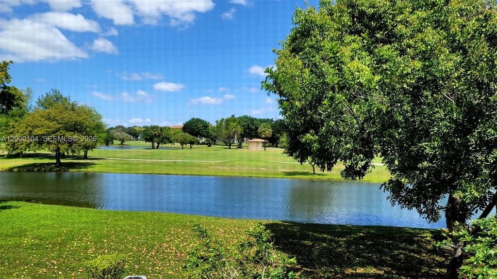 Photo of 13255 SW 7th Ct #203D, Pembroke Pines, FL 33027 (MLS # A12000104)