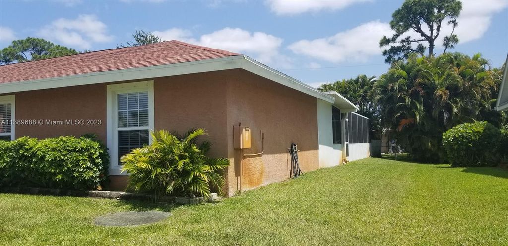 Photo of 963 SE Atlantus Ave, Port Saint Lucie, FL 34983 (MLS # A11389688)