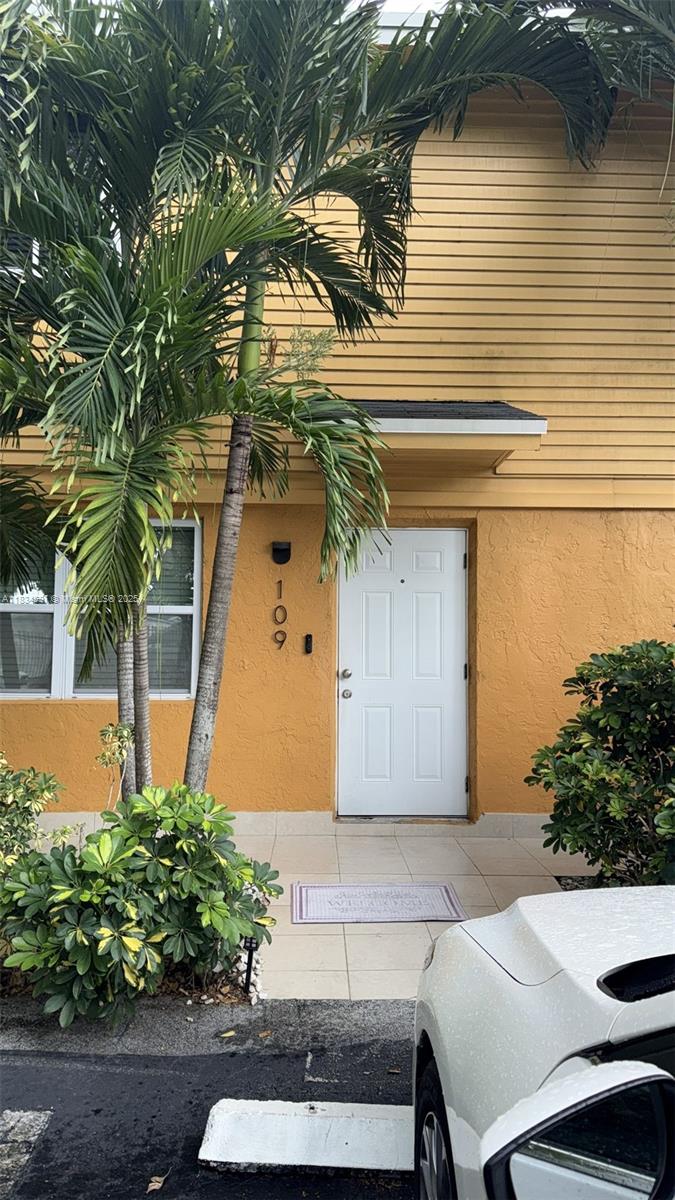 Charming and fully remodeled townhouse-style condo located in the residential community of Sea-Grape Village. This home offers a functional and comfortable layout with a spacious living area, an updated kitchen, and a full bathroom on the first floor, along with an in-unit washer and dryer. Upstairs, you'll find two generously sized bedrooms and another full bathroom, providing added privacy and convenience. The property includes two assigned parking spaces located directly in front of the unit. Enjoy living in a quiet neighborhood with nearby parks, and close access to N Homestead Blvd, where you’ll find a wide variety of restaurants, shops, and daily conveniences. A great opportunity to live in a well-connected and peaceful area.