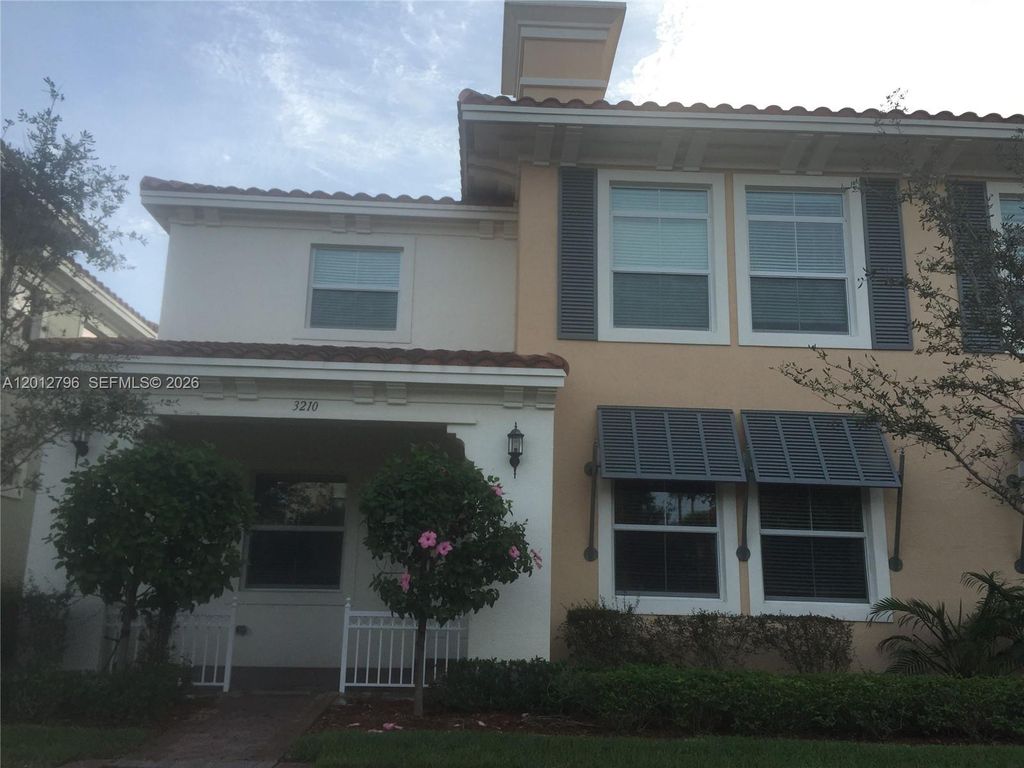 Photo of 3210 NW 126th Avenue #3210, Sunrise, FL 33323 (MLS # A12012796)