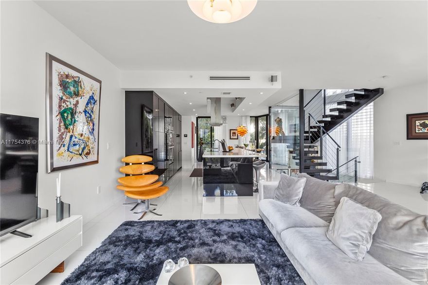 This modern townhouse at 1025 99th St #6 in Bay Harbor Islands offers 4 bedrooms, 3.5 bathrooms, and 2,641 sq ft of meticulously designed living space. Built in 2017, this home boasts high-end, custom finishes throughout, including a contemporary kitchen with bespoke cabinetry, premium stainless steel appliances, and designer fixtures. The open-concept living area is complemented by elegant flooring, custom-built closets, and refined lighting accents that add a touch of sophistication. Located in a well-maintained community, this residence is just minutes from Bal Harbour Shops, beautiful beaches, and top-rated schools, making it an ideal blend of luxury and convenience.