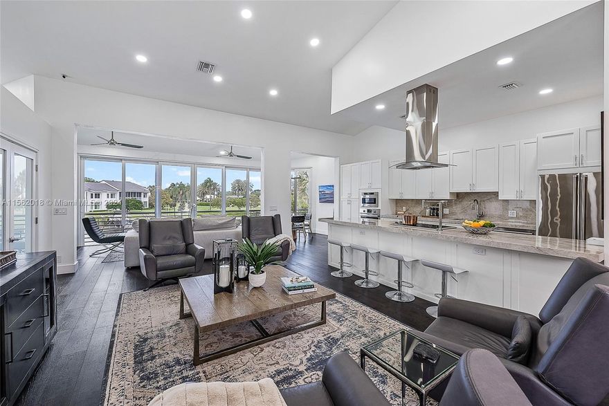 Renovated Unit conveniently located within walking distance to The Club, Tennis/Pickleball, Marina and Restaurants. This unit has it all, glassed in sunroom for additional living space, open family room and kitchen floor plan, with all new appliances, countertops, cabinets and flooring, plus a den/3rd bedroom. Luxurious primary retreat with large bath and sitting room. Enjoy the views from the glassed in sunroom of the waterways and golf.