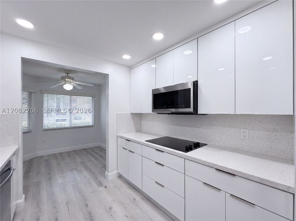 Photo of 750 SW 138th Ave #103F, Pembroke Pines, FL 33027 (MLS # A12082706)