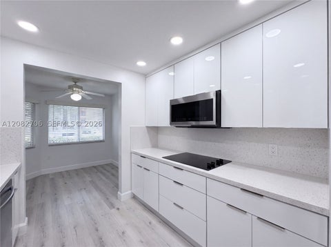 Photo of 750 SW 138th Ave #103F, Pembroke Pines, FL 33027 (MLS # A12082706)