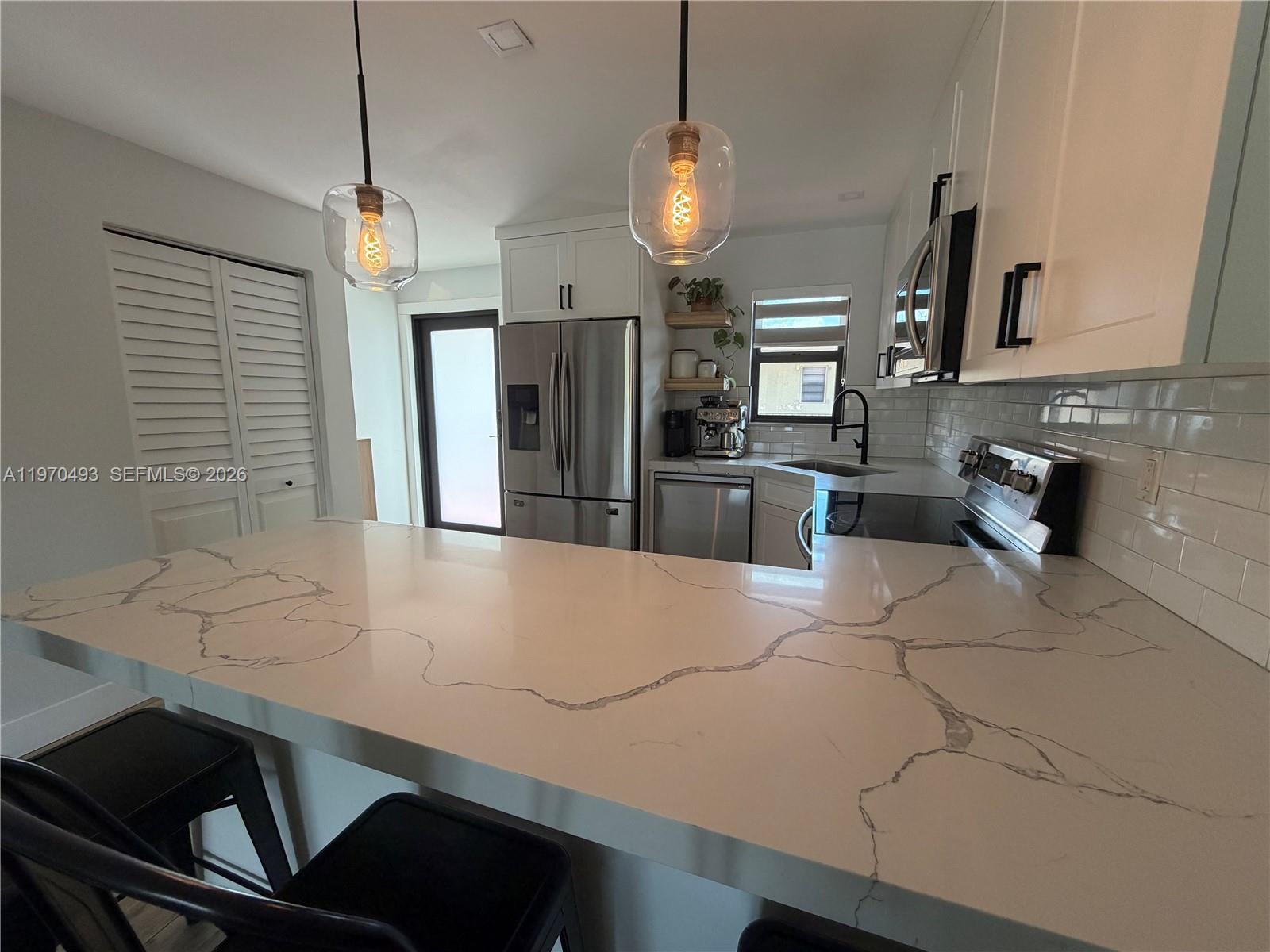 PALM AVE GARDENS CONDO - Residential