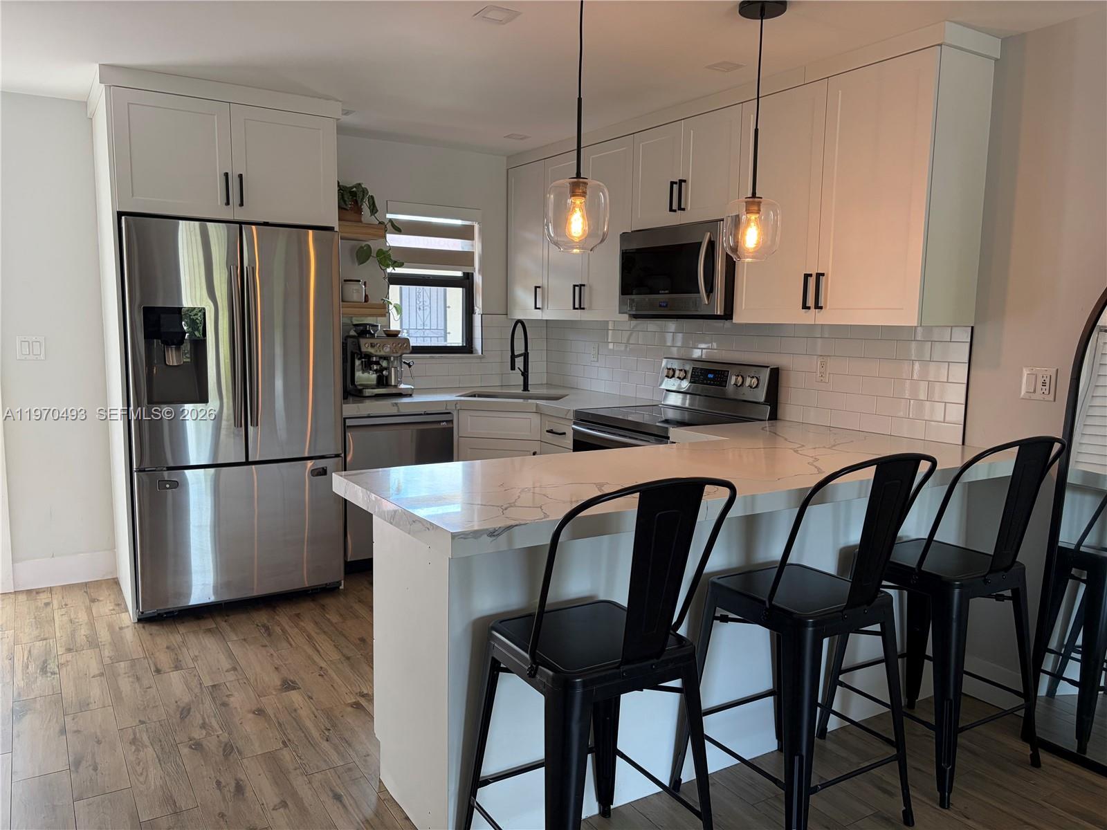 PALM AVE GARDENS CONDO - Residential