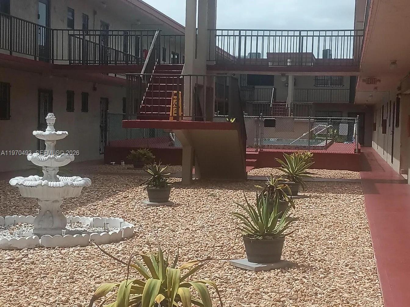 PALM AVE GARDENS CONDO - Residential