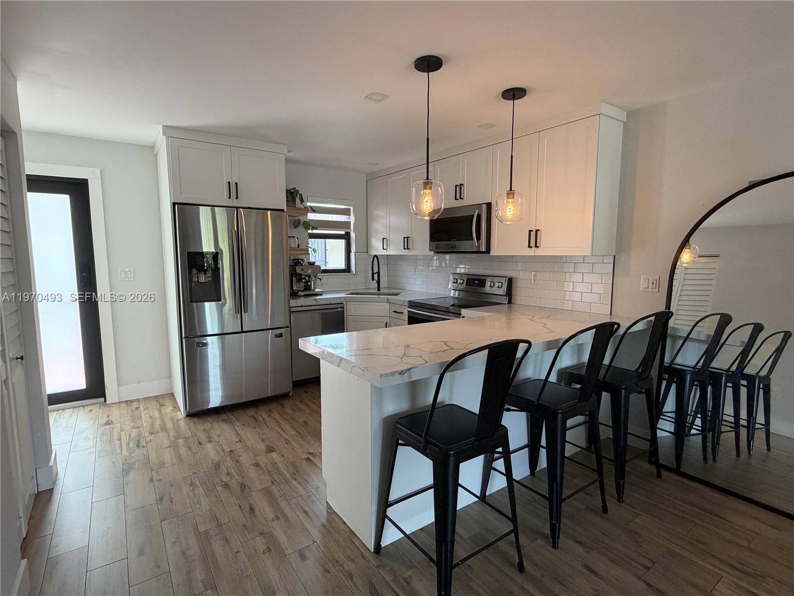 PALM AVE GARDENS CONDO - Residential