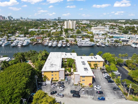 Photo of 815 Middle River Dr #312, Fort Lauderdale, FL 33304 (MLS # A12108119)