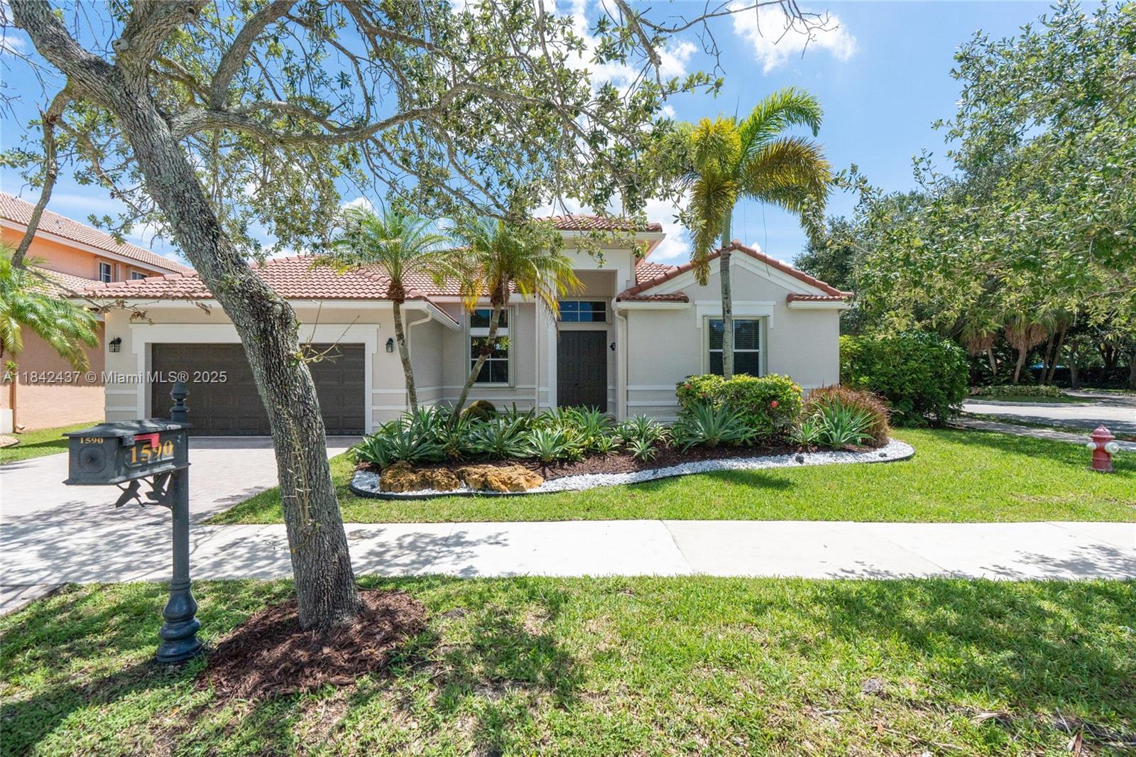 1590 Osprey Bnd, Weston, FL, 33327/$1,125,000 1 1590 Osprey Bnd