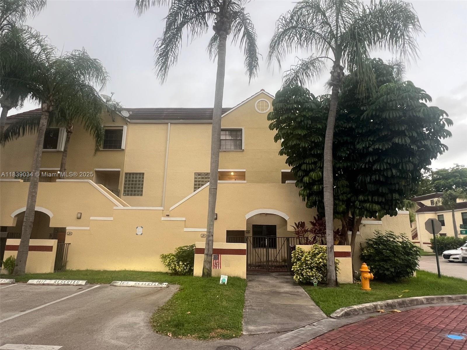 Charming 3-bedroom, 2-bath unit located on the ground floor in the desirable Elan at Calusa community. This well-maintained home features tile and wood flooring throughout, a spacious kitchen and baths, and a private fenced-in patio—perfect for relaxing or entertaining. Enjoy the convenience of a dedicated utility room with a full-size washer and dryer. The community offers great amenities, including a pool and clubhouse. Prime location close to shopping, dining, schools, and major highways. A wonderful opportunity to own in a sought-after neighborhood!