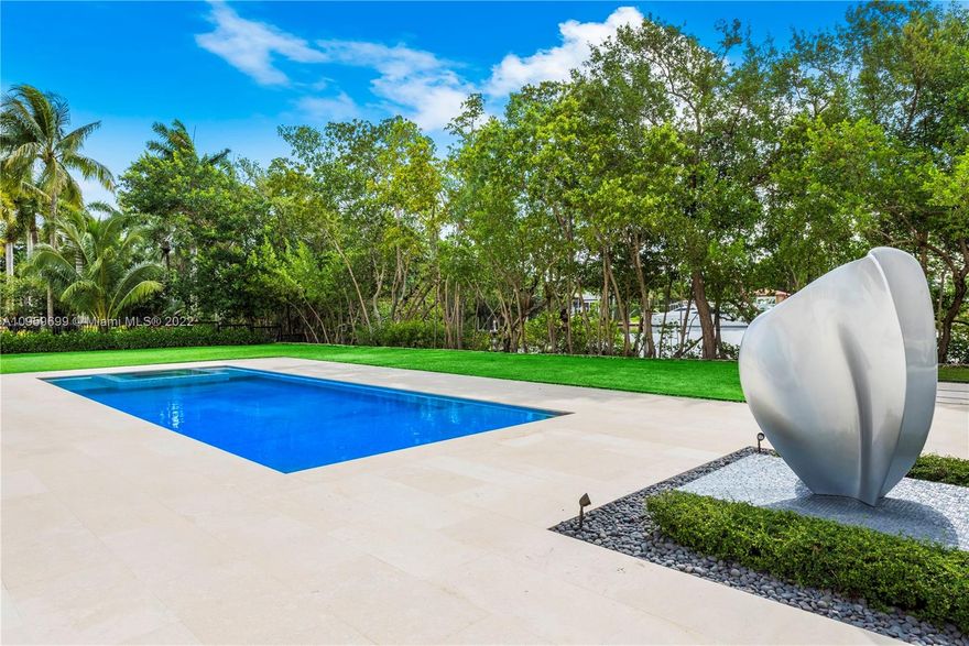 2021 Masterpiece located in one of only two private & gated Coral Gables communities. Set on almost 2 acres w 200' of water & direct ocean access, this magnificent estate has been meticulously designed for the most discerning Buyer. Spectacular soaring entry leads to six beds & 7 baths spread over 12,829 SqFt of la. Chef’s kitchen is an epicurean dream w gourmet kitchen featuring gas cook-top, cooking island, food warmer, double ovens & a large window overlooking  pool & waterway. Covered terraces, 2nd story terraces and expansive pool area featuring a fully equipped outdoor kitchen & dining area w BBQ grill.Gym, indoor rock climbing wall, wine cellar, full home generator & 9car garage (w height for lifts) are some of the luxuries which make this estate one of a kind. (Adj SqFt 13,212)