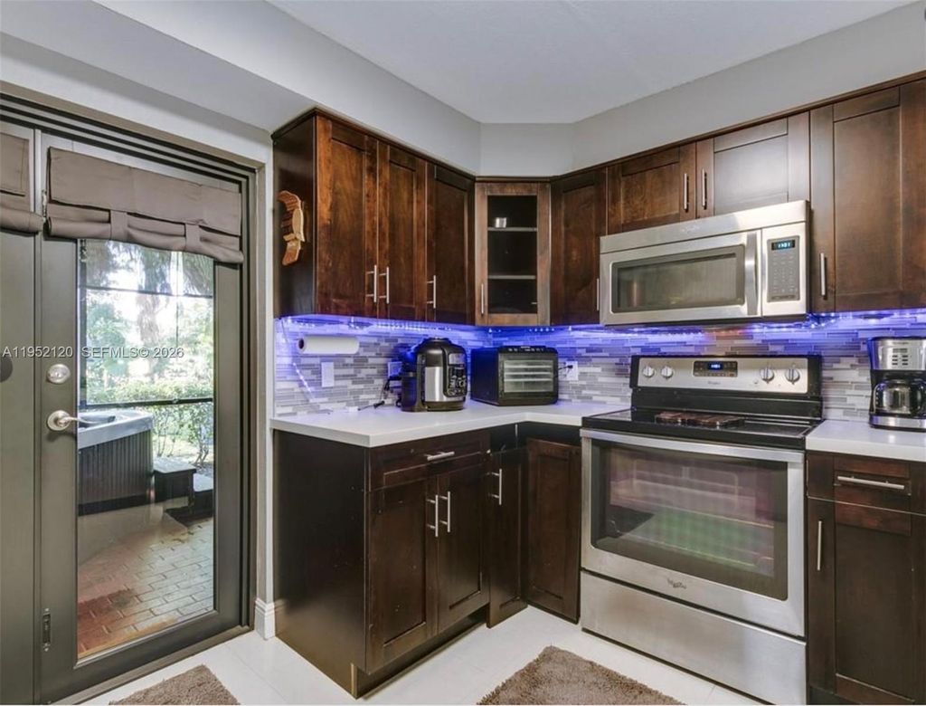 Photo of 227 Wimbledon Lake Dr #227, Plantation, FL 33324 (MLS # A11952120)