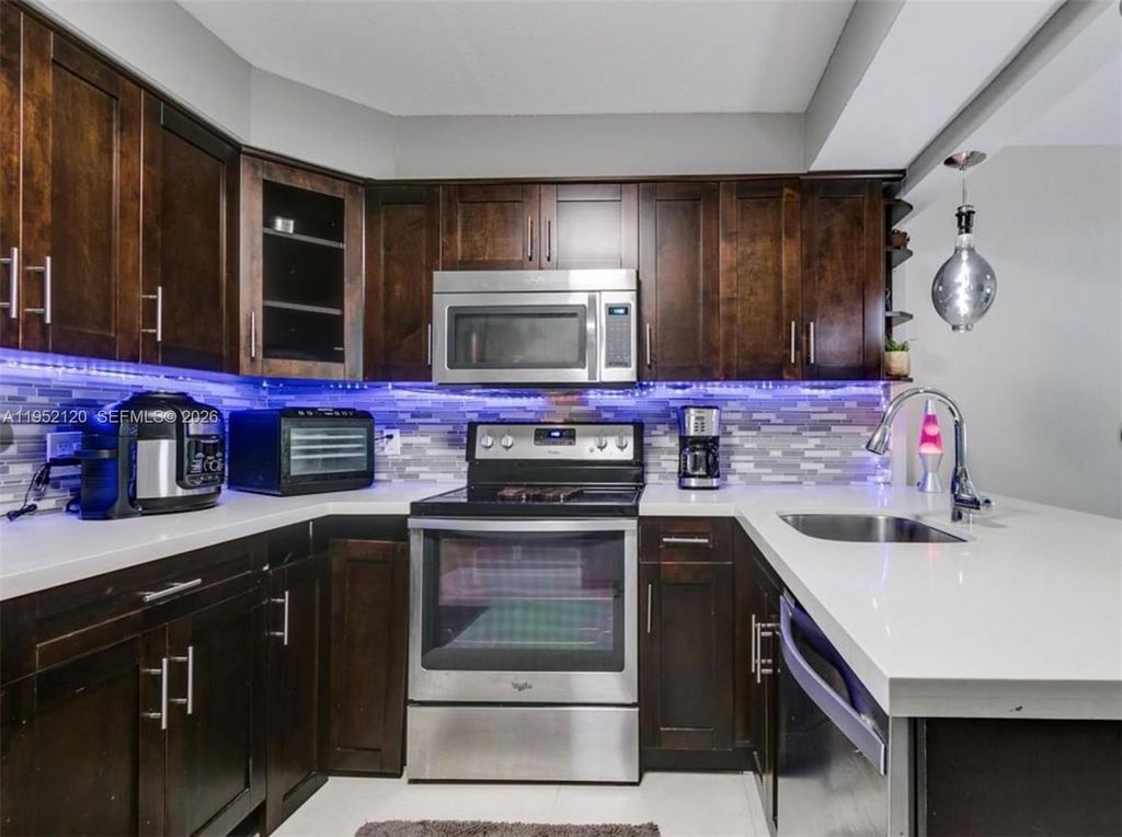 Photo of 227 Wimbledon Lake Dr #227, Plantation, FL 33324 (MLS # A11952120)