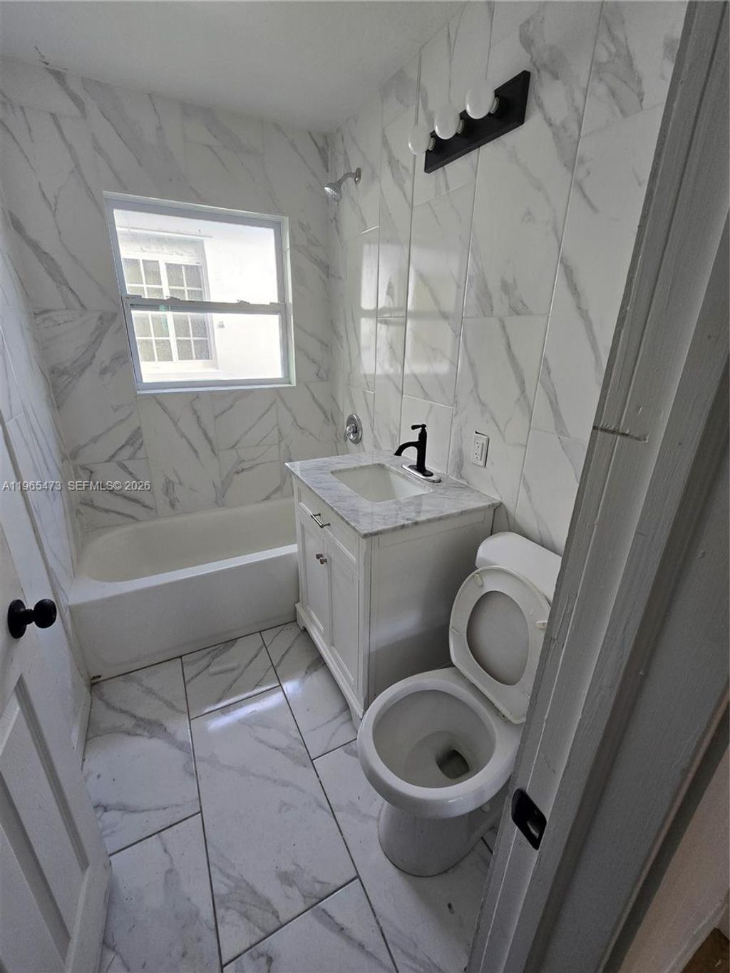 Photo of 4000 Greenwood Ave, West Palm Beach, FL 33407 (MLS # A11965473)