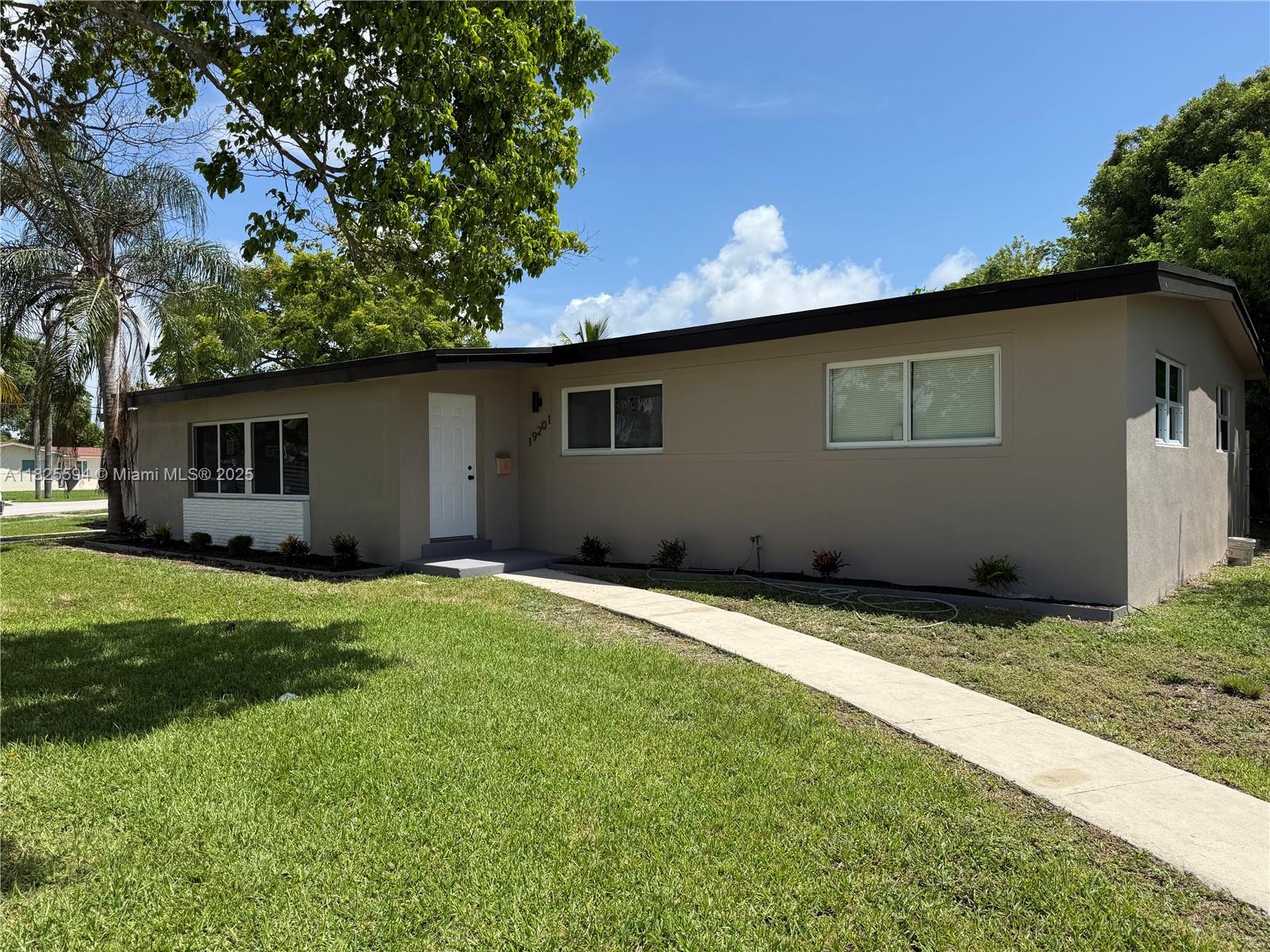 Welcome to this beautifully remodeled 4-bedroom, 2-bathroom home situated on a desirable corner lot! Step inside to find an open and airy floor plan filled with natural light, brand-new vinyl flooring, and fresh interior and exterior paint. The updated kitchen features sleek stainless steel appliances, modern cabinetry, quartz countertops, and a stylish backsplash—perfect for cooking and entertaining.
Both bathrooms have been completely renovated with contemporary finishes, including designer tile, new vanities, and upgraded fixtures. The generously sized bedrooms offer comfort and versatility—ideal for families, guests, or a home office. New roof, new windows ! Don't miss this opportunity .Easy to show