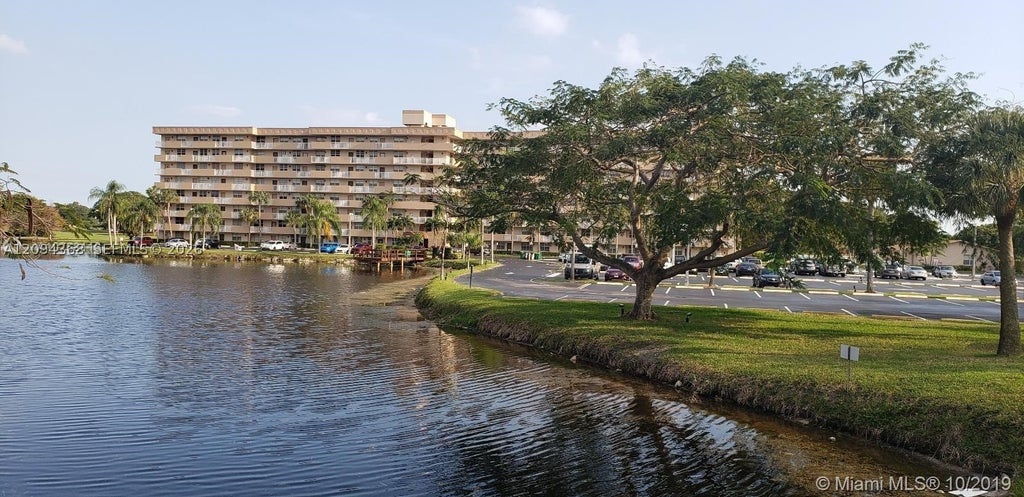 Photo of 250 Jacaranda Dr #305, Plantation, FL 33324 (MLS # A12094368)