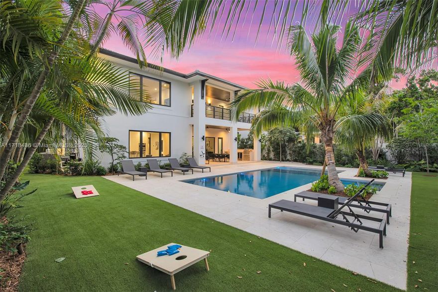 Investors dream generating over half a million dollars in revenue. This 2022-built masterpiece boasts an open floor plan with 5 bedrooms and 6 bathrooms across 4,308 sq ft. Revel in luxury with a game room, high ceilings, and floor-to-ceiling windows. Enjoy outdoor living on the private terrace or by the below-ground pool. The home features a gourmet kitchen with stainless steel appliances, a wet bar, and a marble bathroom with a jacuzzi tub. Situated on an oversized 10,050 sq ft lot covered by lush landscaping, this residence offers unparalleled sophistication.