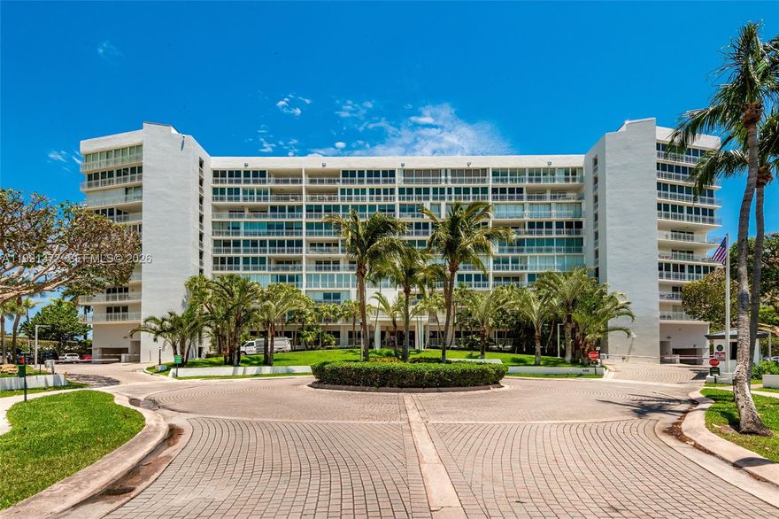 Experience elevated living in an oceanfront building that offers breathtaking views of sunsets, the bay, and Village of Key Biscayne.  This high-floor 2-bedroom, 2-bathroom residence in Mar Azul features 1,670 square feet of interior space, along with an open-air balcony off the living room and master bedroom.
Enjoy the comfort and functionality of a spacious layout that includes a double door entrance with a front foyer to welcome you home. A large galley kitchen  includes a wine refrigerator and stainless steel appliances, a laundry room with an ice machine, and proper storage.  The large bedrooms offer ample closet space with all built-ins.  The second bedroom is an ensuite with a full bathroom.
This boutique beachfront building provides direct beach access, a swimming pool, a gym, air-conditioned storage, and assigned parking, plus additional guest parking available.  This is a wonderful opportunity to enjoy panoramic views, expanded living space, and the charm of island living—all in one remarkable residence. easy and comfortable. Remodeled common areas, full-time security and guard gate, green spaces, plus concrete restoration completed. What are you waiting for!