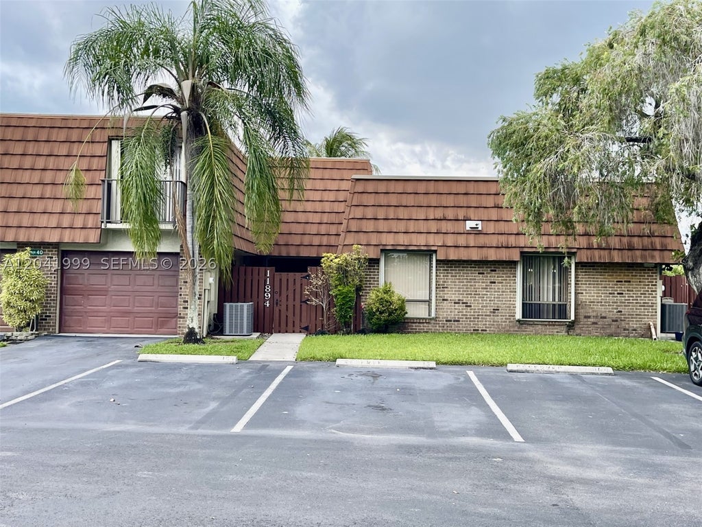 Photo of 11894 SW 12th Pl #11894, Davie, FL 33325 (MLS # A12041999)
