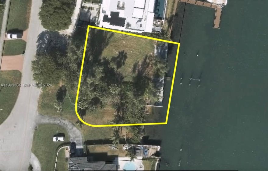 Incredible opportunity to build your dream waterfront estate on this oversized 12,764 SF lot with sweeping panoramic bay views. Located just 7 miles north of Downtown Miami in a rapidly transforming neighborhood surrounded by new luxury construction.
This exceptional waterfront parcel offers 92 feet of prime bay frontage, creating an ideal setting for a spectacular custom luxury home.
Properties of this scale, with direct open-bay exposure and generous frontage, are extremely rare. Perfect for developers or discerning buyers seeking to create a true trophy waterfront residence in one of Miami’s most exciting up-and-coming areas.
All photos are renderings for a previously approved home to be built.