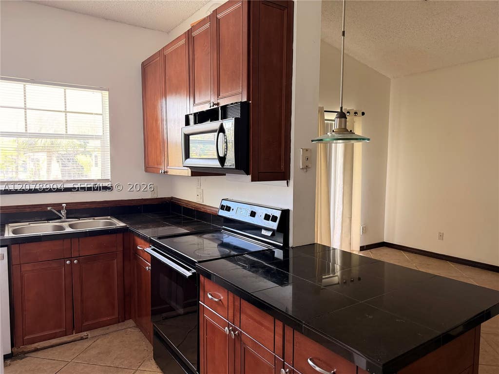Photo of 891 Cypress Park Way #P6, Deerfield Beach, FL 33064 (MLS # A12078904)