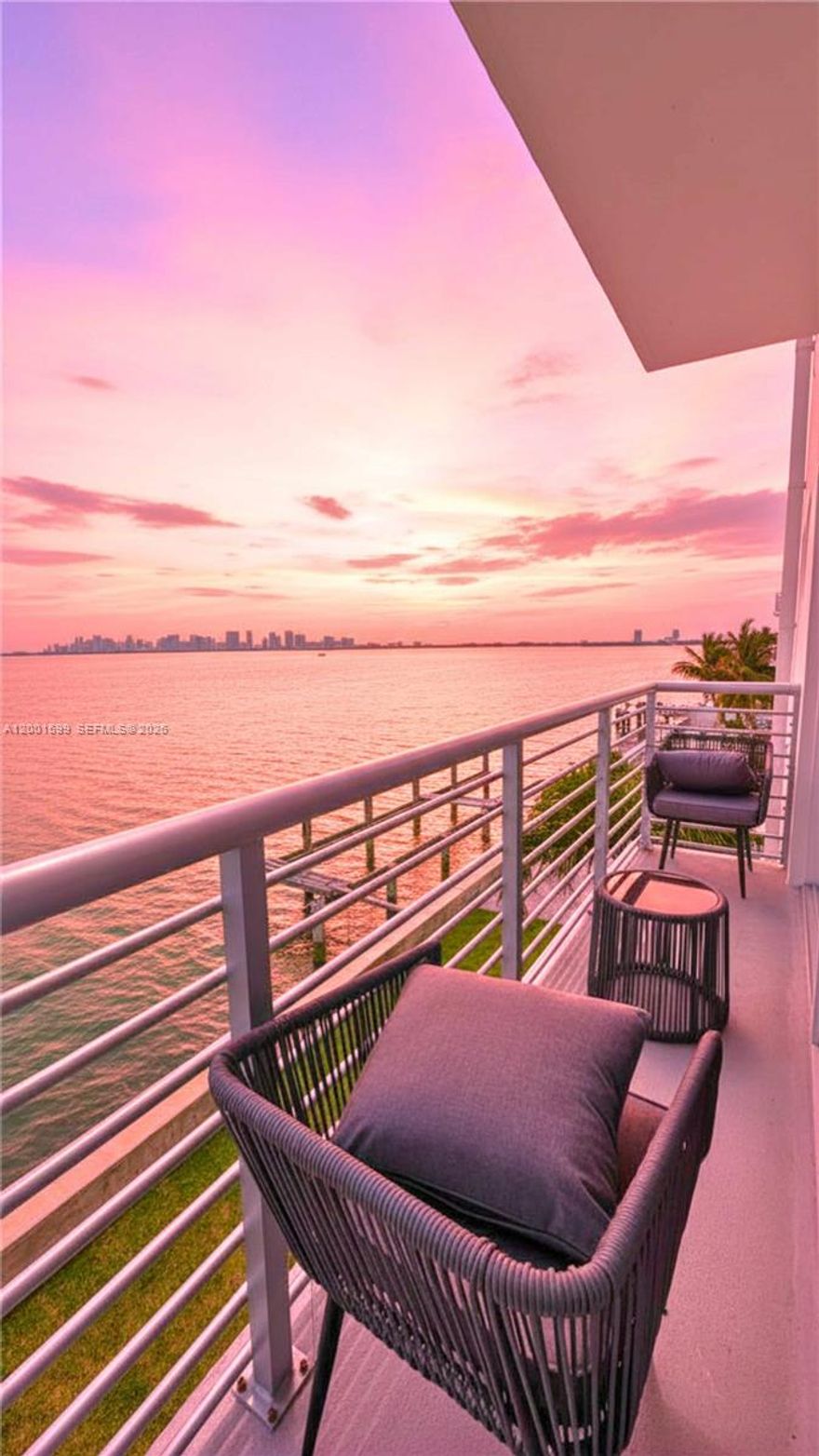 Gorgeous sunsets and sweeping direct bay views from this 3-bedroom, 2-bath corner residence, with water vistas from every bedroom and the living room. Wake up and wind down to shimmering views that stretch across Downtown Miami, South Beach, and the Port of Miami. Enjoy sun-filled days by the Bayfront pool, perfectly positioned along the water. The unit offers three generously sized bedrooms, tiled floors throughout, a spacious walk-in closet, and abundant storage—providing comfort and functionality. Set within a charming boutique building featuring secure card-key entry and a spacious lobby. The property has been thoughtfully updated with new balcony railings, impact windows, fresh exterior paint, and a new awning—creating a clean, modern curb appeal. Located in the Heart of the Bay, North Bay Village with assigned parking. This is a fantastic opportunity to enjoy relaxed island living at an attractive price. Just minutes from the beach and close to world-class destinations like the Design District and Wynwood. Exciting neighborhood enhancements are underway, including a brand-new Community Center just one block away with pickleball and padel courts, set to open in 2026.
