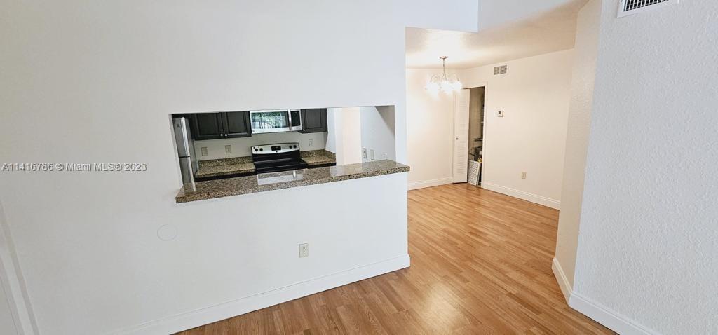 Photo of 1715 Village Blvd #305, West Palm Beach, FL 33409 (MLS # A11416786)