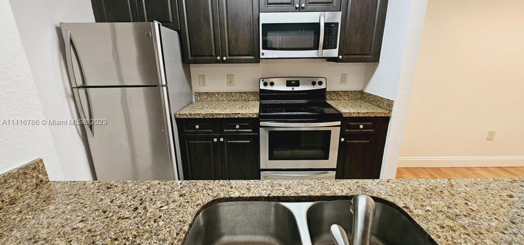 Photo of 1715 Village Blvd #305, West Palm Beach, FL 33409 (MLS # A11416786)