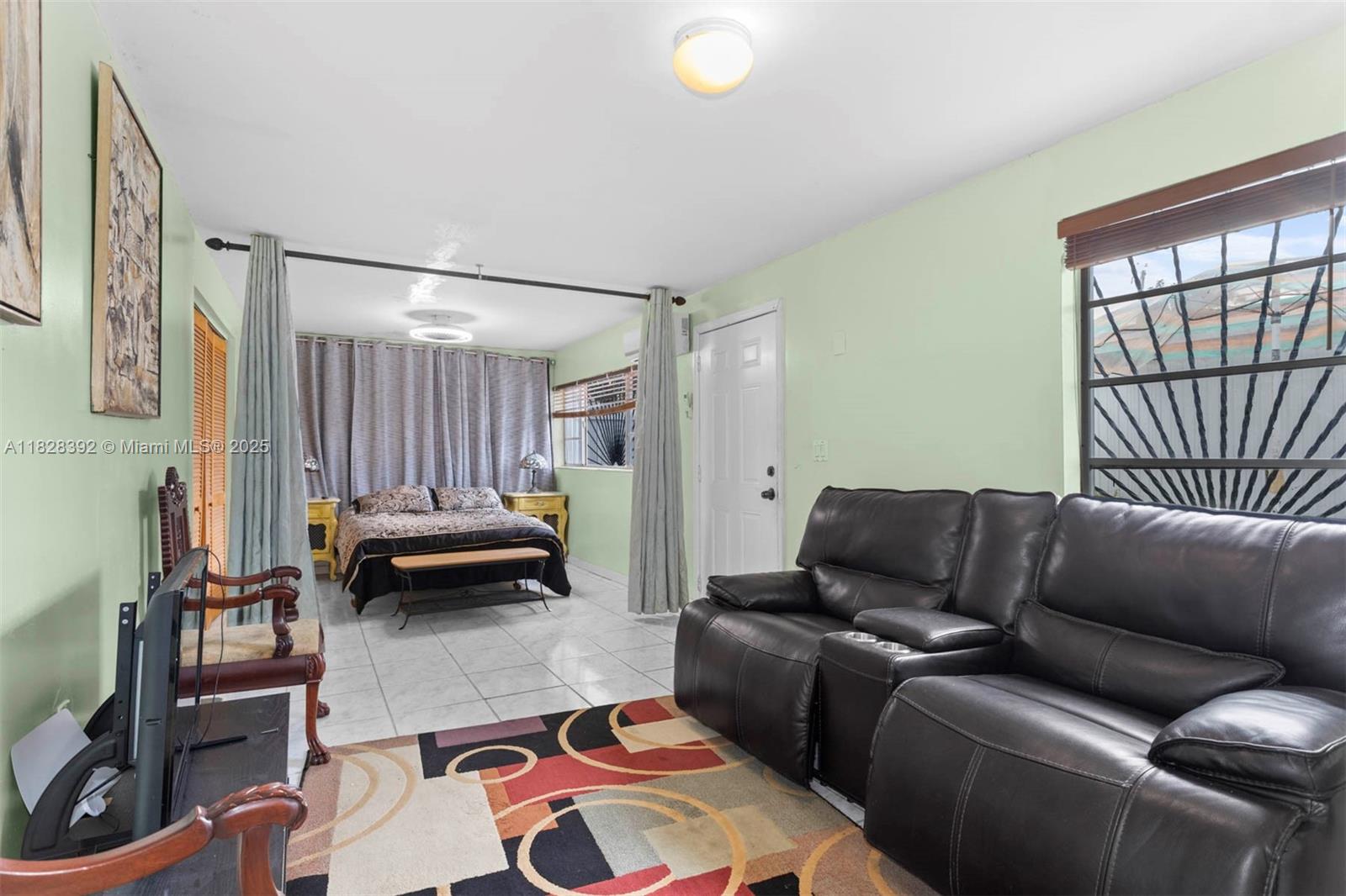 Go into this charming and fully furnished spacious studio with 700 sqft, 1-bath, in the heart of North Miami Beach. Designed for convenience and comfort, this space includes two parking spaces, ensuring stress-free living. The unit boasts a newer fridge, two split AC units, and two TVs for your entertainment. Enjoy outdoor living with access to a communal area featuring a grill, perfect for relaxing or hosting gatherings. Ideally located just minutes from Aventura Mall, Hallandale Beach, the highway and other hotspots, this efficiency puts you at the center of it all. No HOA application needed. Quick and easy move-in process.