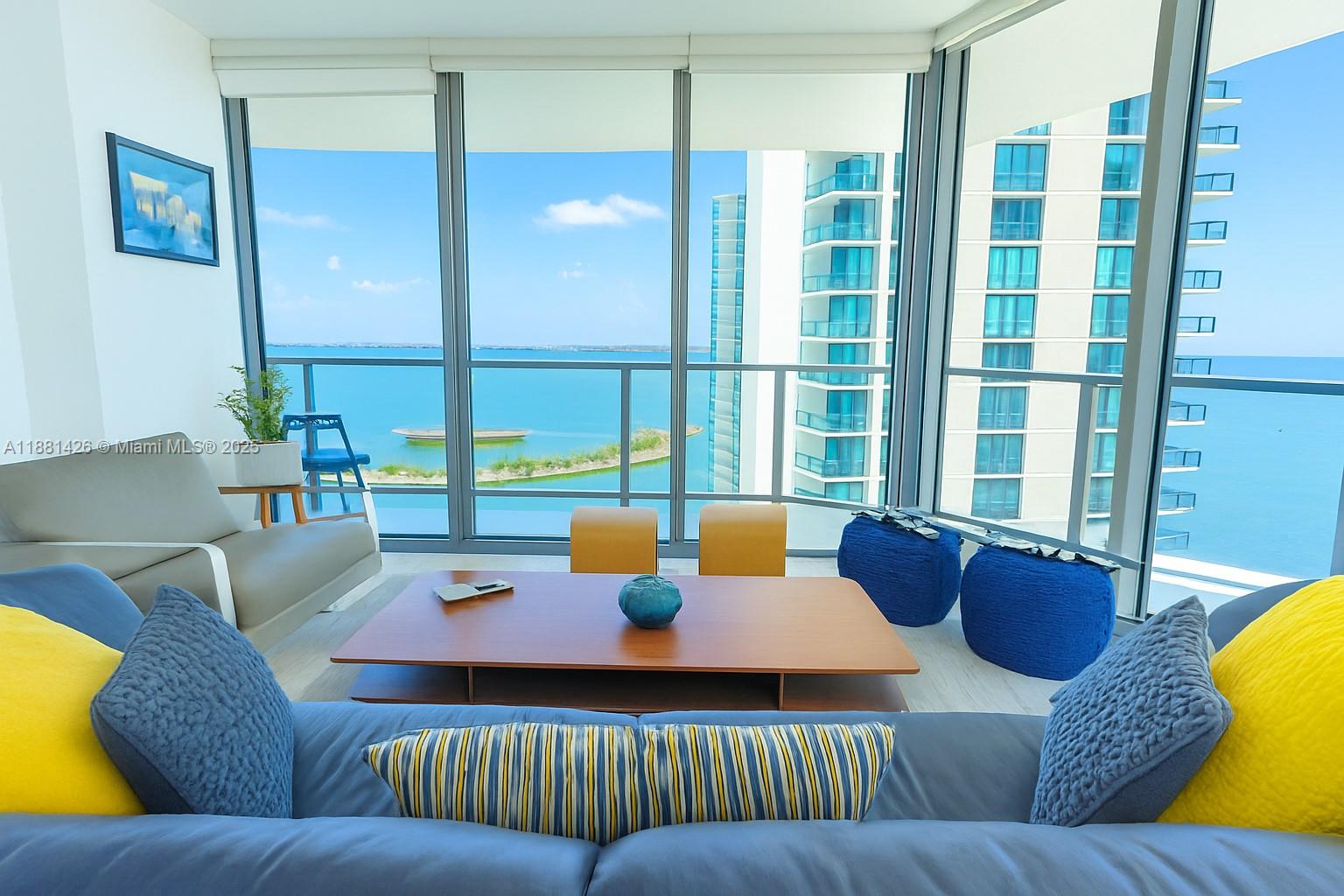 Enjoy breathtaking panoramic views of Biscayne Bay and the vibrant Miami skyline from your private, floor-to-ceiling glass-enclosed balcony. This modern 3-bedroom, 2-bathroom condo features an open-concept layout, an Italian kitchen with top-of-the-line Bosch appliances, and a spacious living area perfect for entertaining. Resort-style amenities including a rooftop pool, state-of-the-art fitness center, spa, movie theater, and a private beach club with access to the exclusive Amara at Paraiso restaurant. Located in the heart of Miami's Edgewater neighborhood, you're just minutes from the Design District, Wynwood, and the city's best dining and entertainment. Experience the ultimate in luxury urban living! Easy to show.
