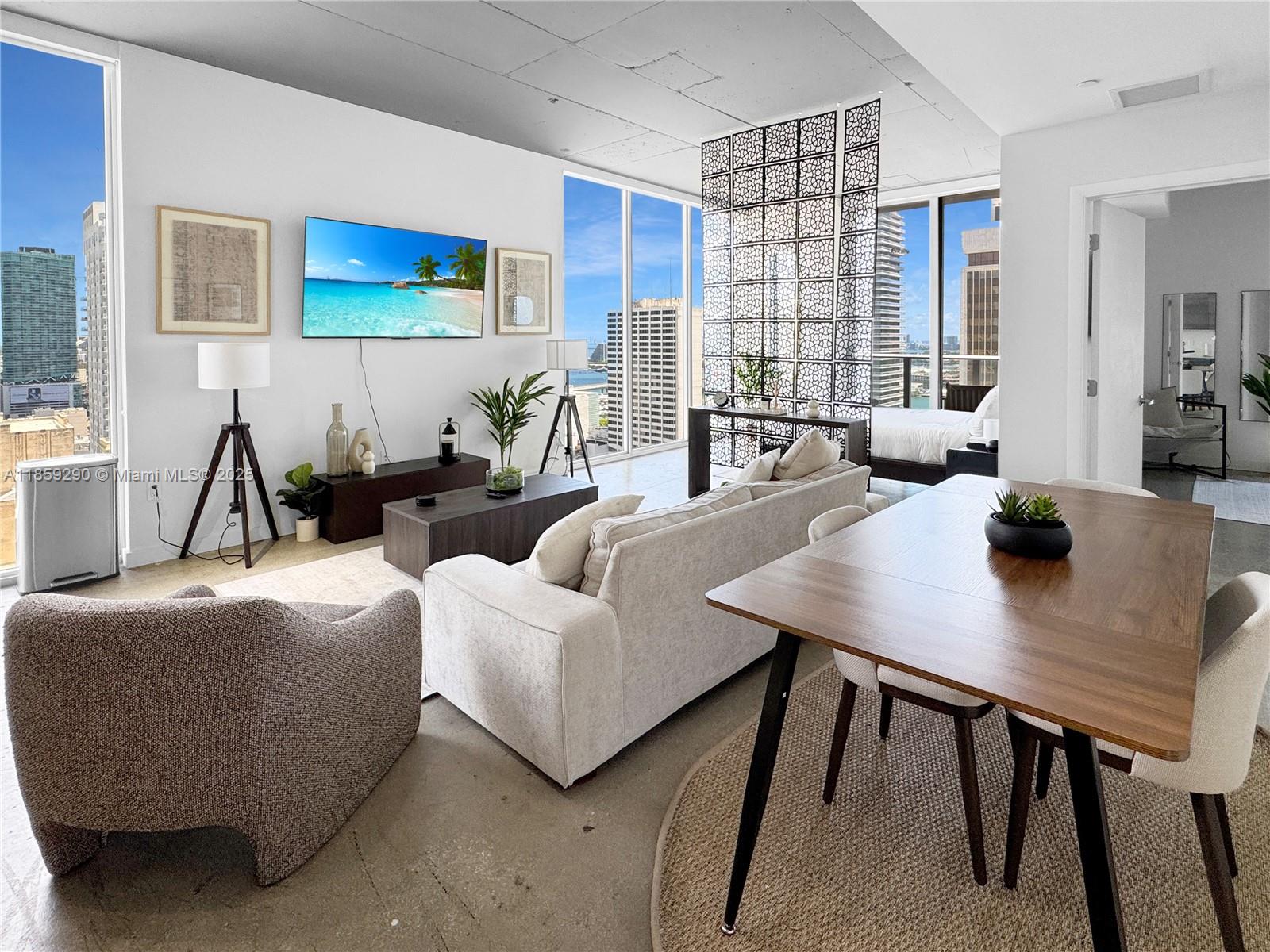 Modern Furnished 2Bed/1Bath Loft in the Heart of Downtown Miami – Available Now! Experience the vibrant lifestyle of Downtown Miami in this beautifully furnished 2-bed/1-bath loft-style apartment featuring an open floor plan, high ceilings, and modern finishes. Perfectly situated just 2 blocks from Brickell and within walking distance to the Kaseya Center, top-rated restaurants and shops. Located in Centro Condo, this residence includes access to an impressive list of amenities: a rooftop pool; a two-story sky lounge with a ping pong table, workspace, bar, and media area; a fitness center with breathtaking views of Downtown Miami; and co-ed sauna and steam room. Residents can park at the Miami Tower garage (approx. $155/month). Long-term and short-term (30 days minimum) rent is available.