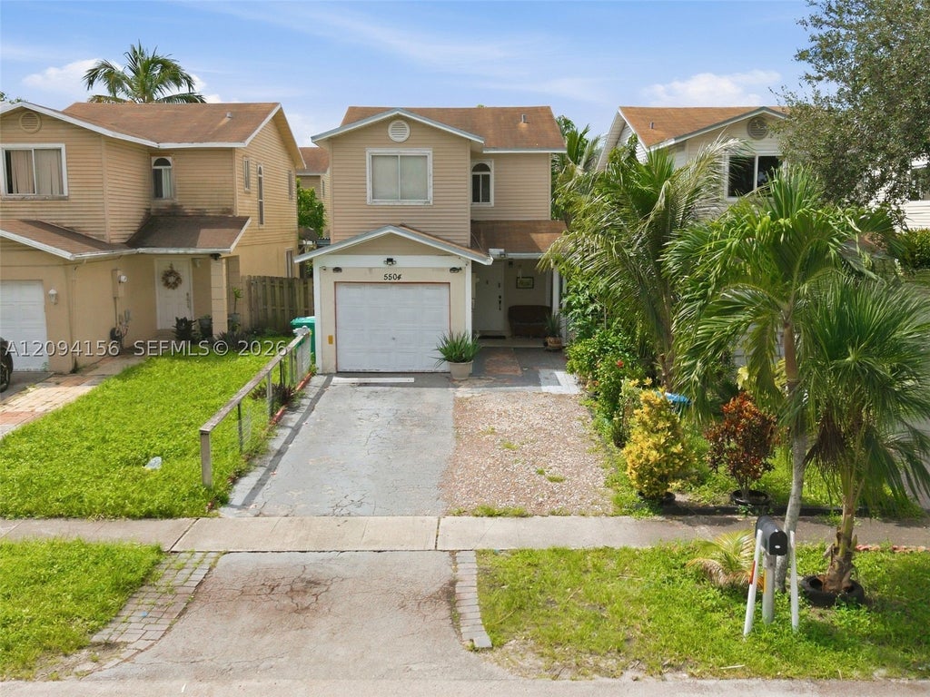 Photo of 5504 NW 22nd St, Lauderhill, FL 33313 (MLS # A12094156)