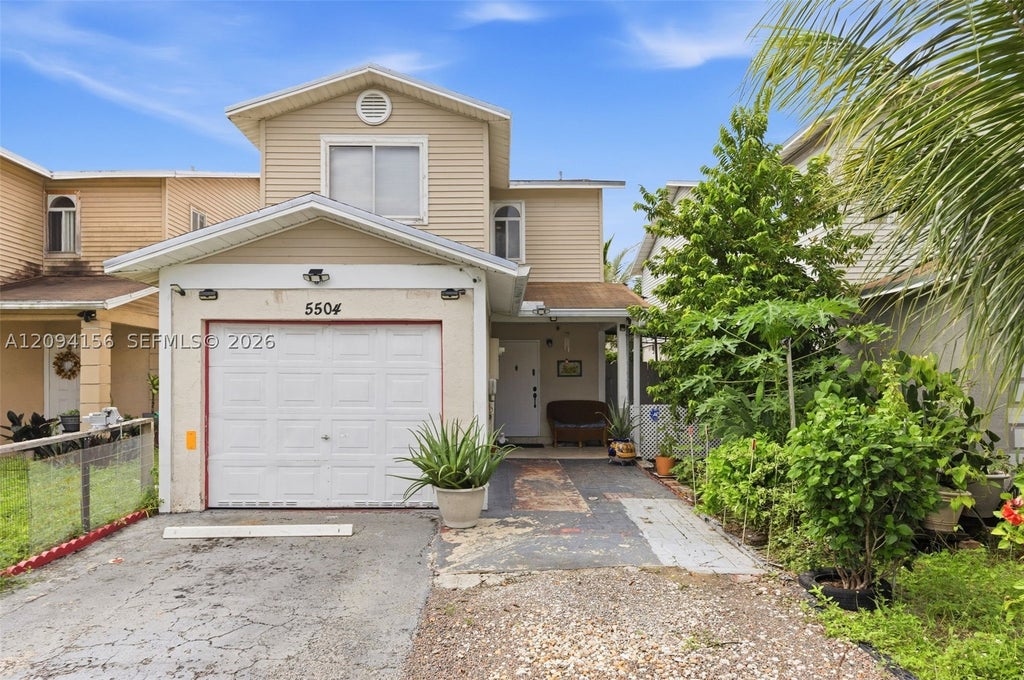 Photo of 5504 NW 22nd St, Lauderhill, FL 33313 (MLS # A12094156)